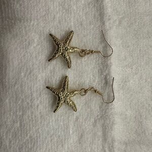 gold star fish earrings